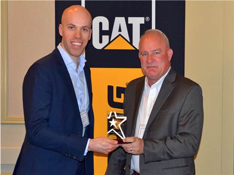 Niek de Winter (left) of Mammoet Canada receiving the Ã¢â‚¬Ëœsupplier of choiceÃ¢â‚¬â„¢ award from Brian Shaw