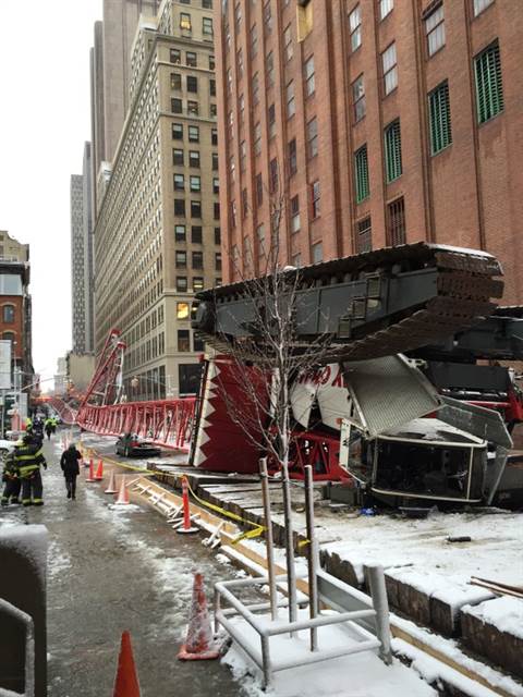 One many was killed and three pedestrians were injured when the crane boom fell.